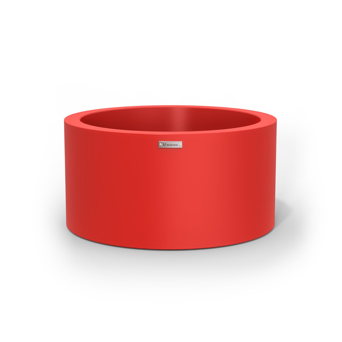 A medium cylinder shaped pot planter in red made by Modscene New Zealand.