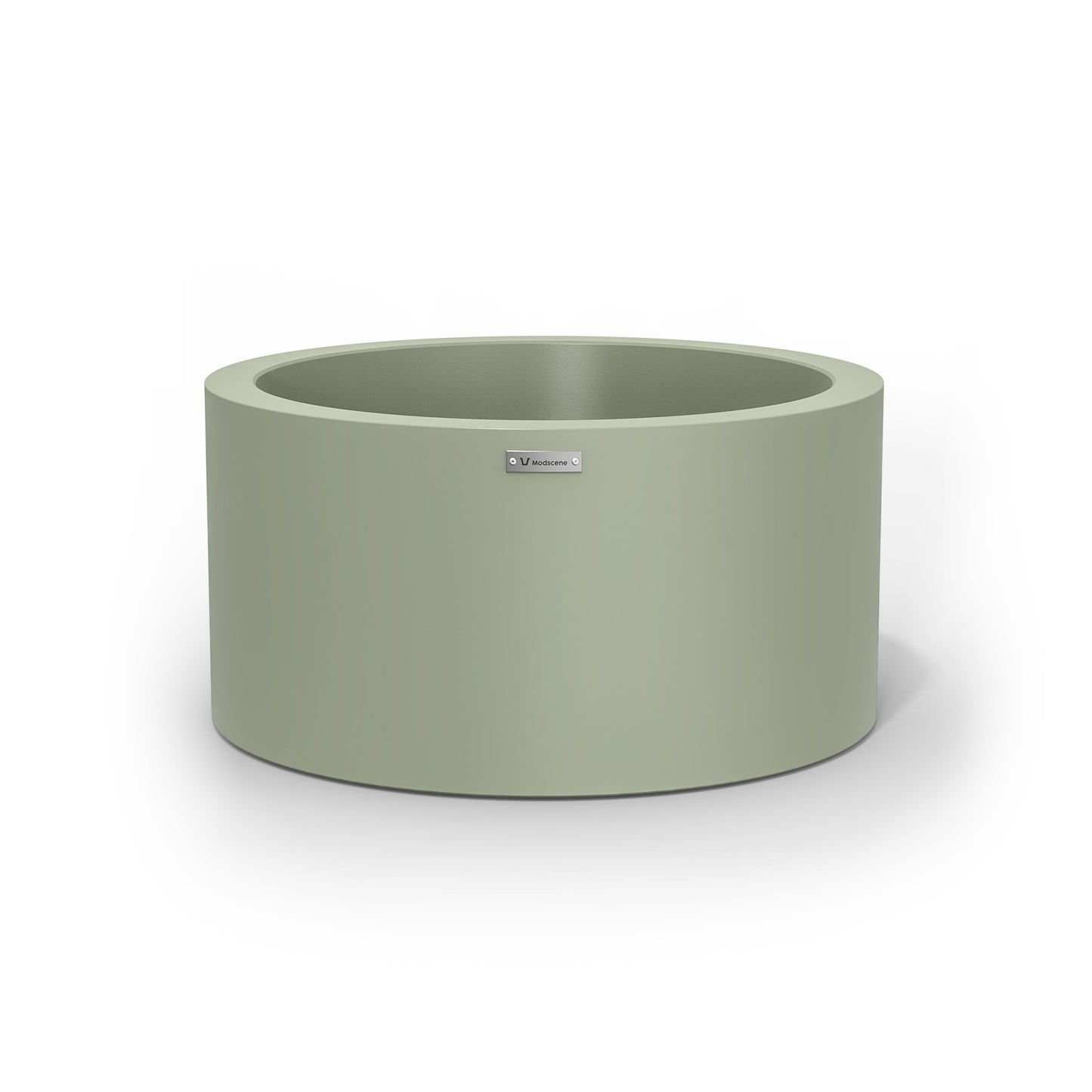 A cylinder shaped pot planter in a pastel green colour.