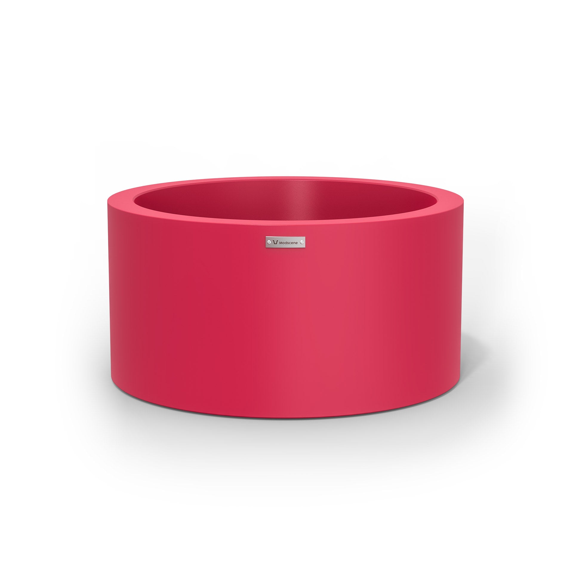 A cylinder shaped pot planter in pink made by Modscene NZ.