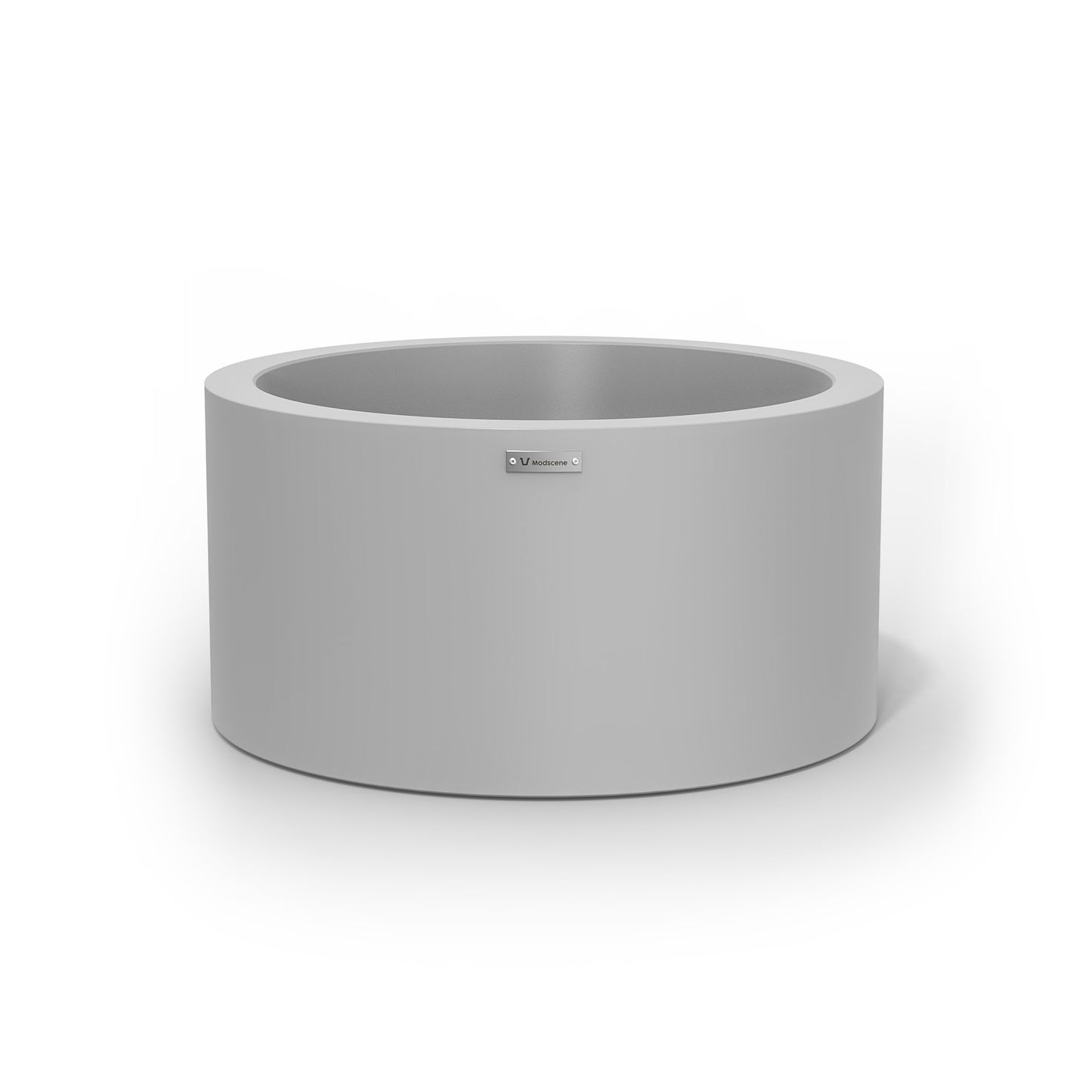 A medium cylinder shaped pot planter in a light grey colour.