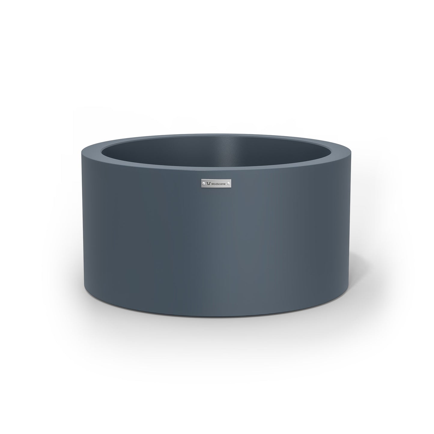 A cylinder shaped pot planter in dark grey made by Modscene NZ.