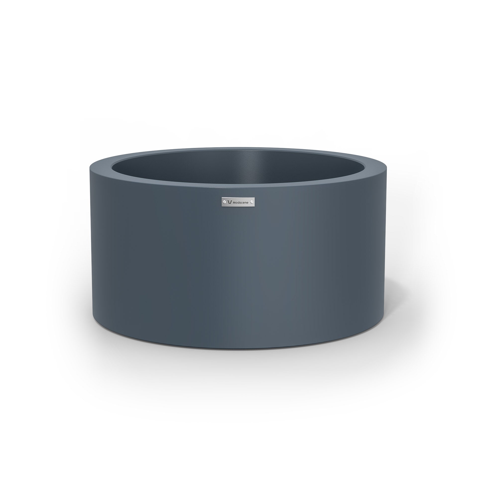 A cylinder shaped pot planter in dark grey made by Modscene NZ.