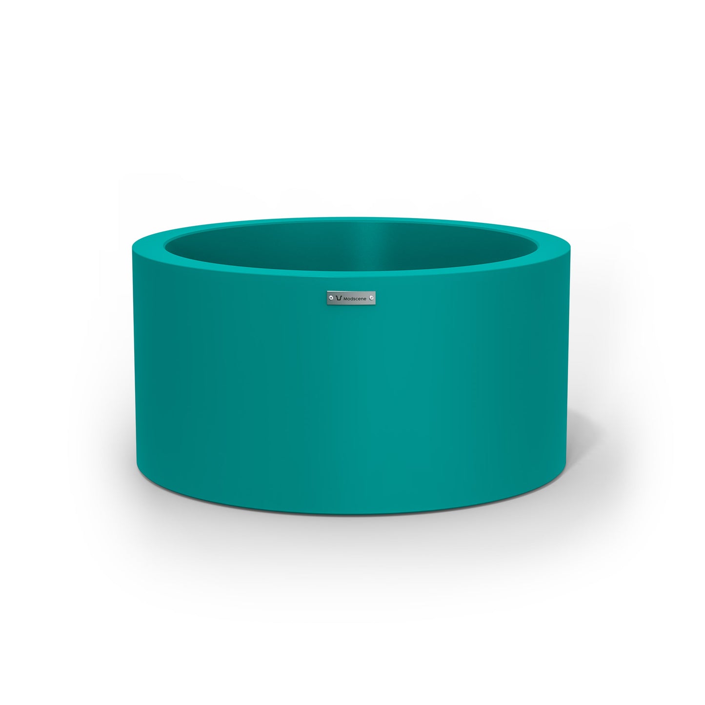 A medium cylinder shaped pot planter in teal made by Modscene NZ.