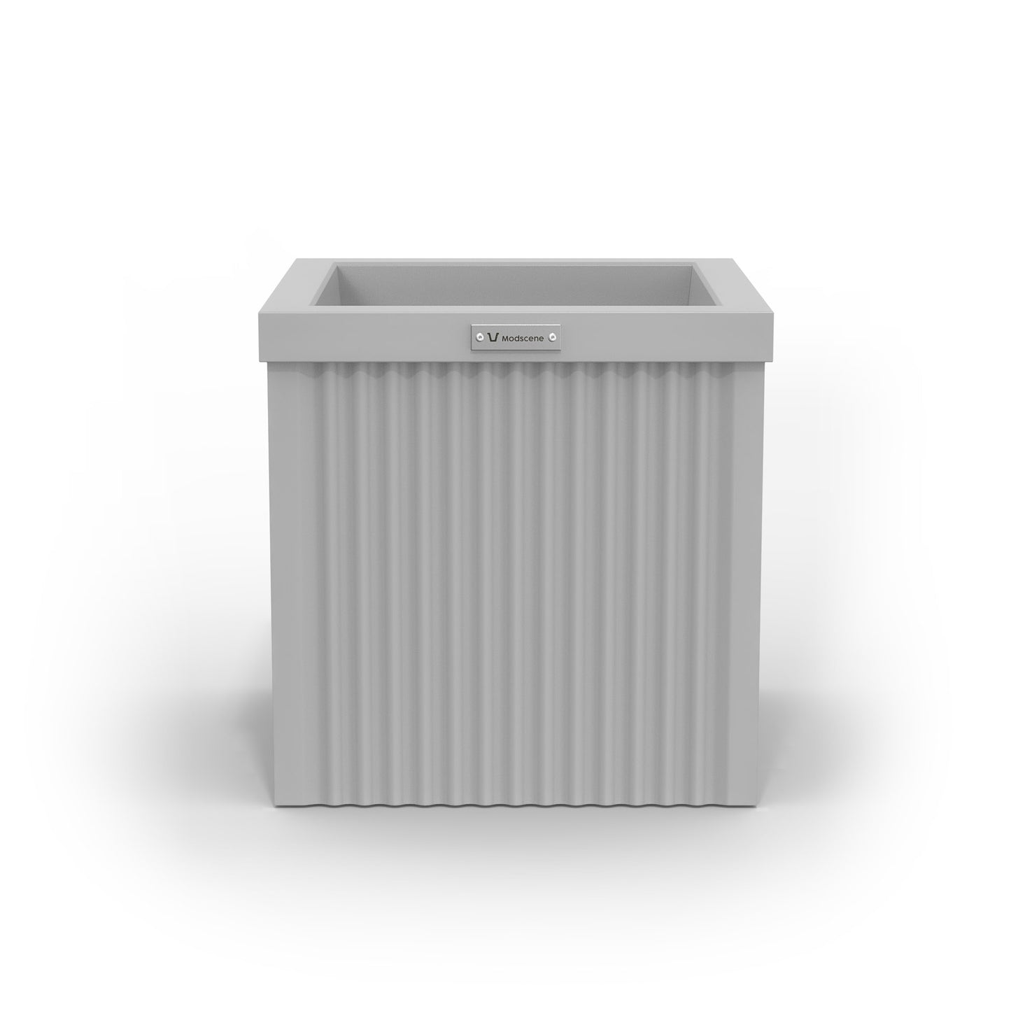 A corrugated square planter pot. The pot planter is light grey in colour.