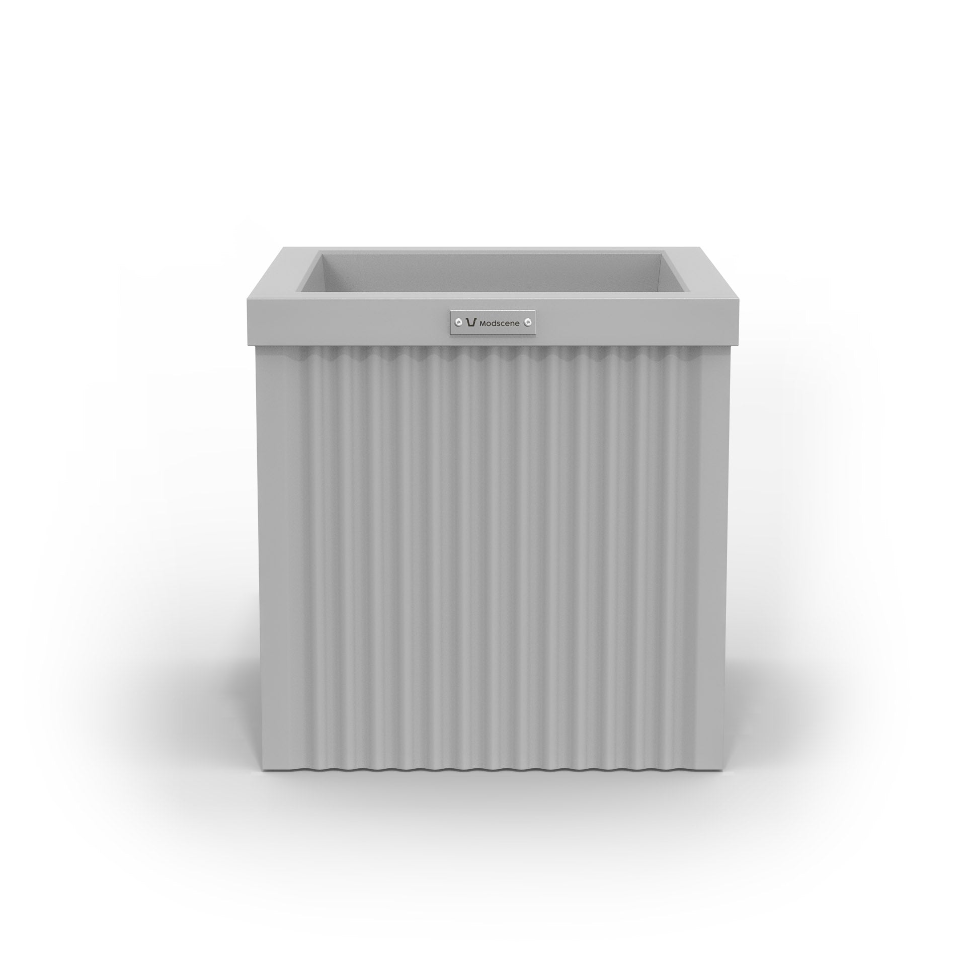 A corrugated square planter pot. The pot planter is light grey in colour.