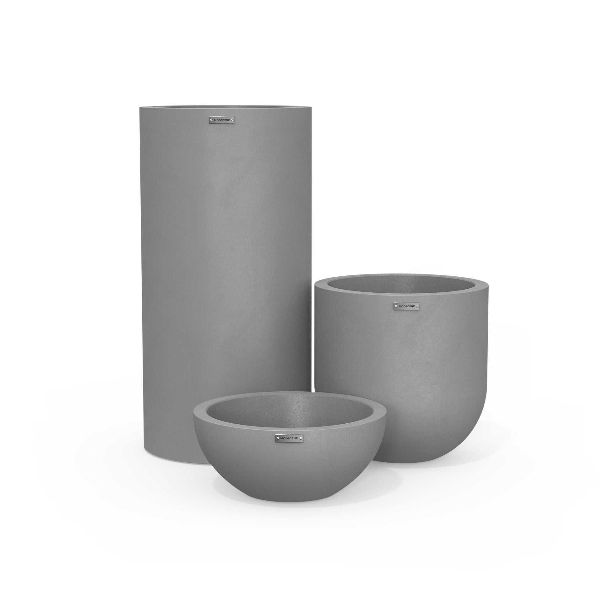 Cluster of three outdoor concrete pots. Beautiful outdoor plant containers NZ.