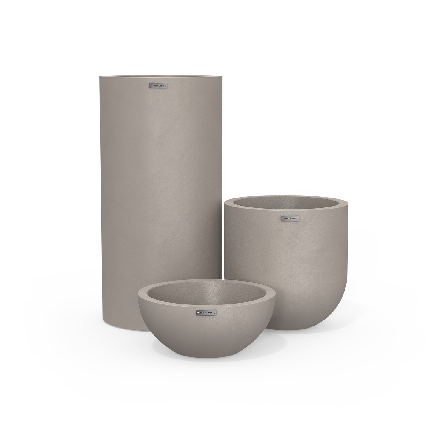 Cluster of three concrete plant pots. Outdoor designer planters NZ.
