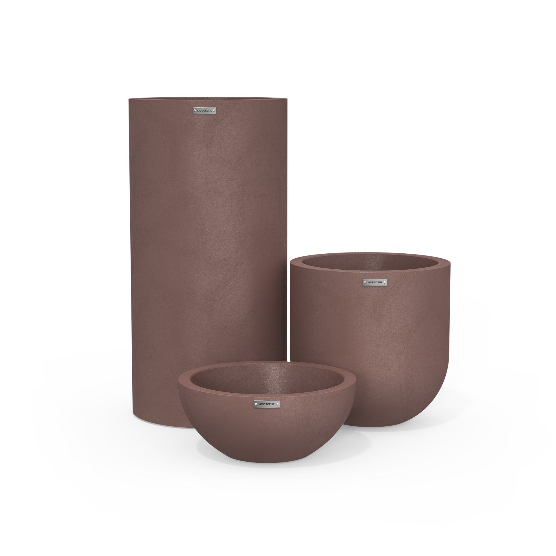 Cluster of three ceramic plant pots in a rustic plum-brown colour.