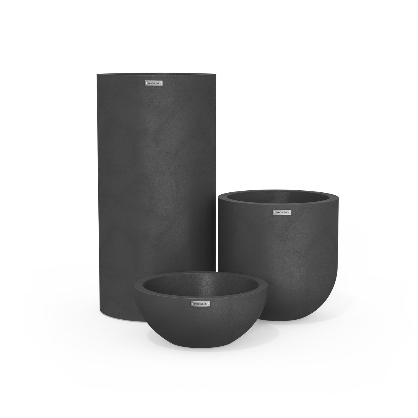 Cluster of three dark grey pots. Outdoor designer planters NZ.