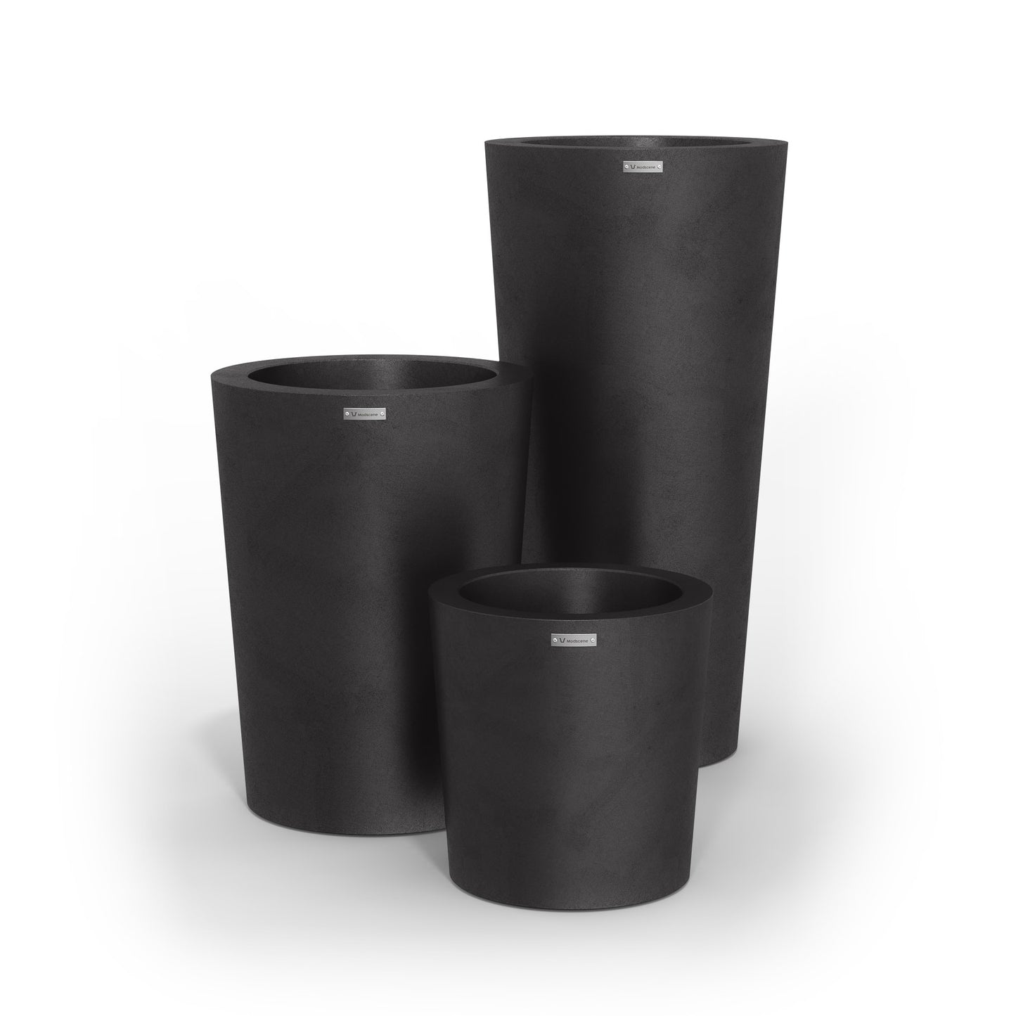 A cluster of three Modscene planter pots in a matte black colour.