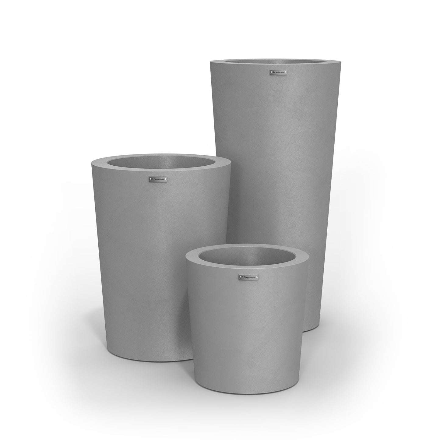 A cluster of three Modscene planter pots in a concrete grey colour.