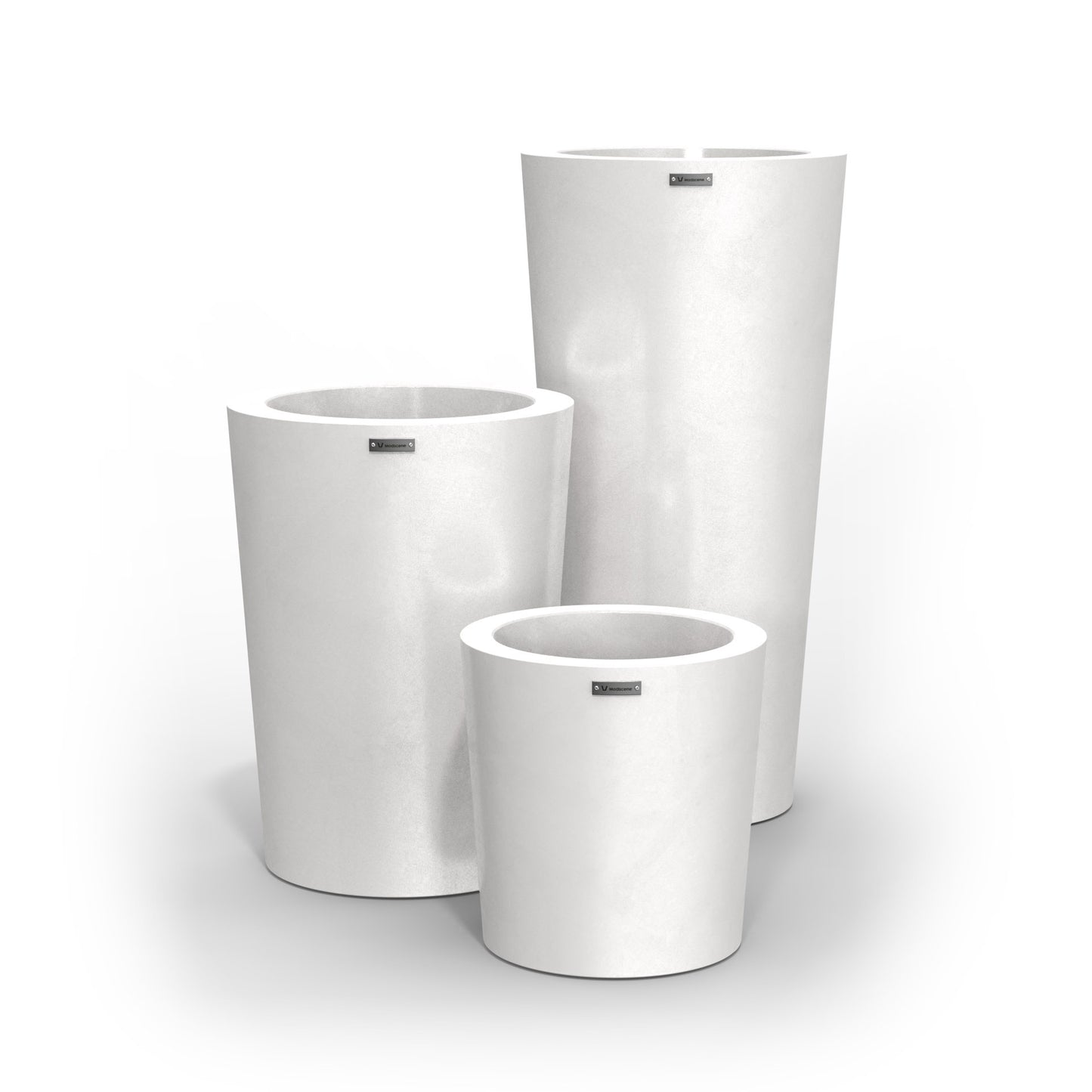 A cluster of three Modscene planter pots in matte white.