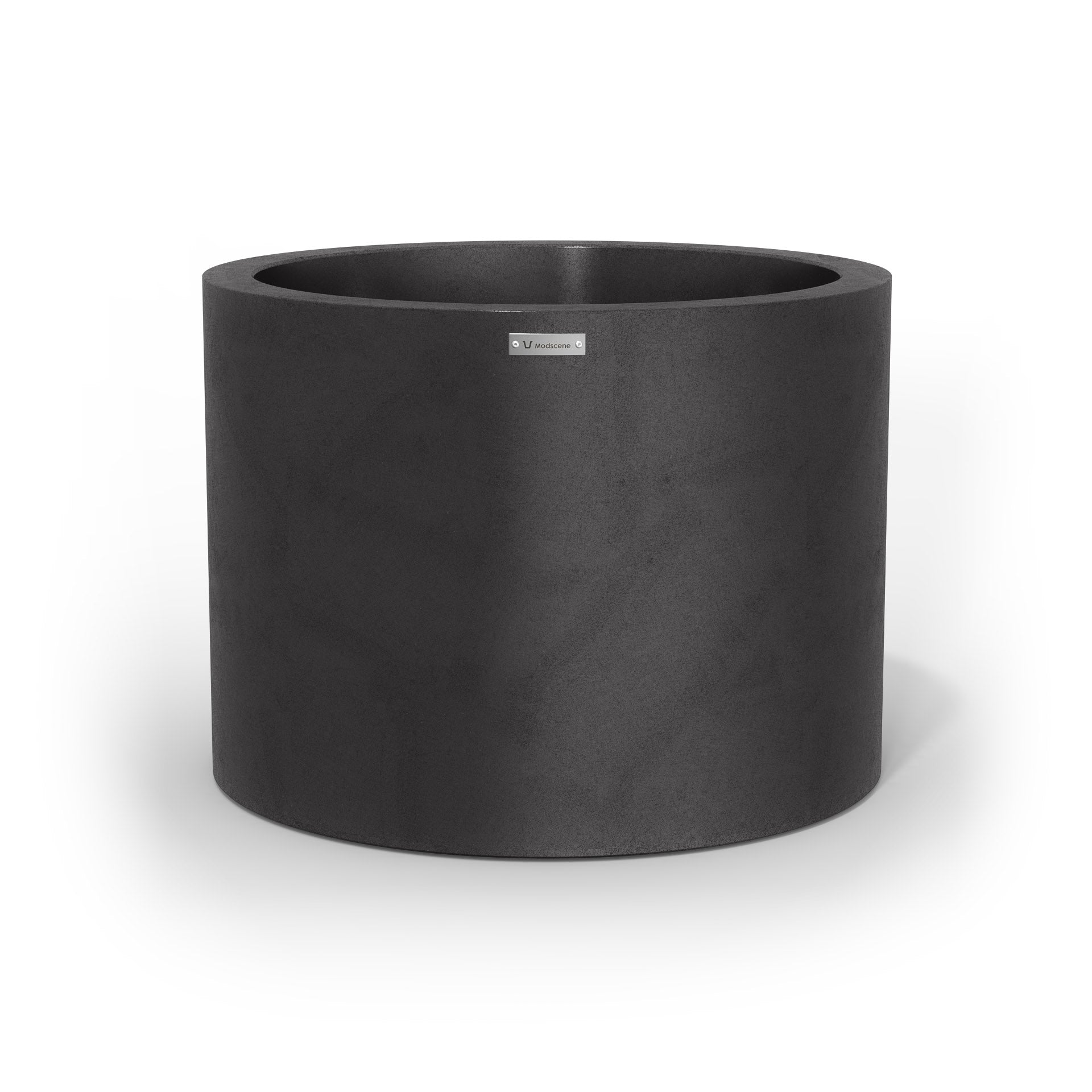 A cylinder shaped pot planter in matte black made by Modscene NZ.