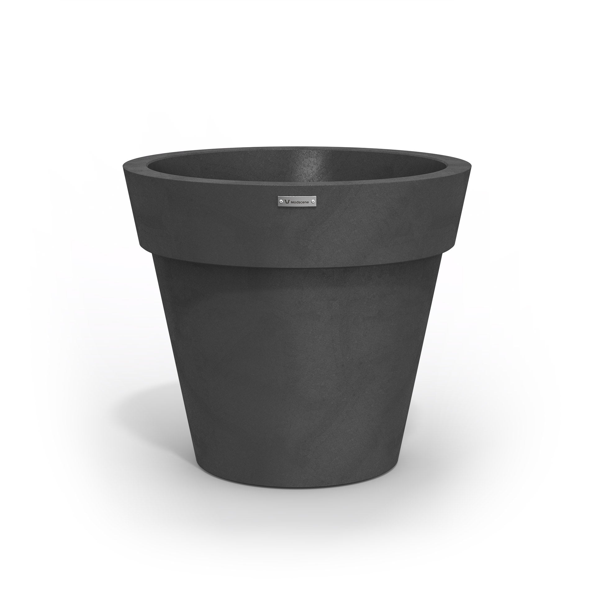 A Modscene plastic planter pot in a dark grey colour with a concrete look.