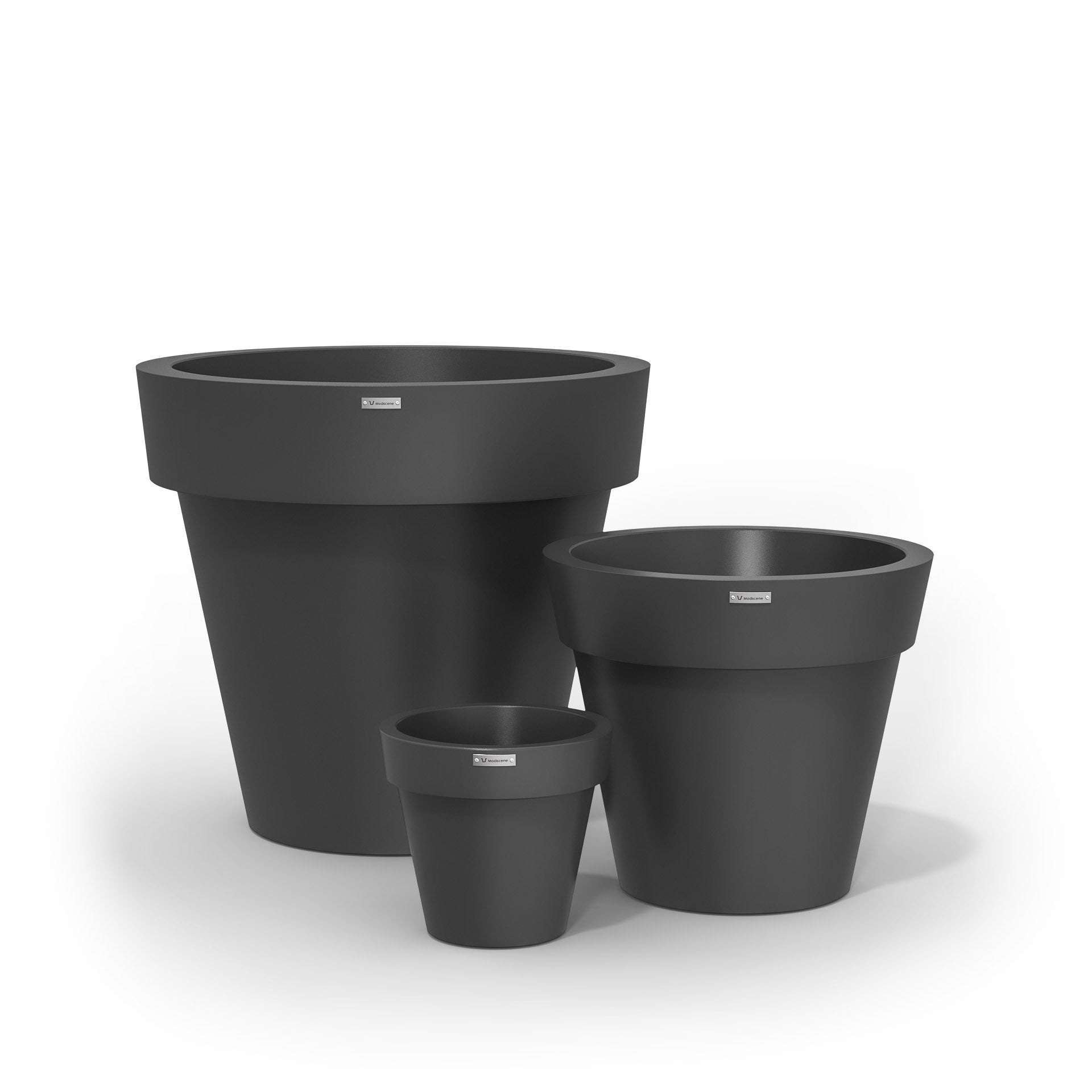 A cluster of three Modscene planter pots in a dark grey colour. New Zealand made planters.
