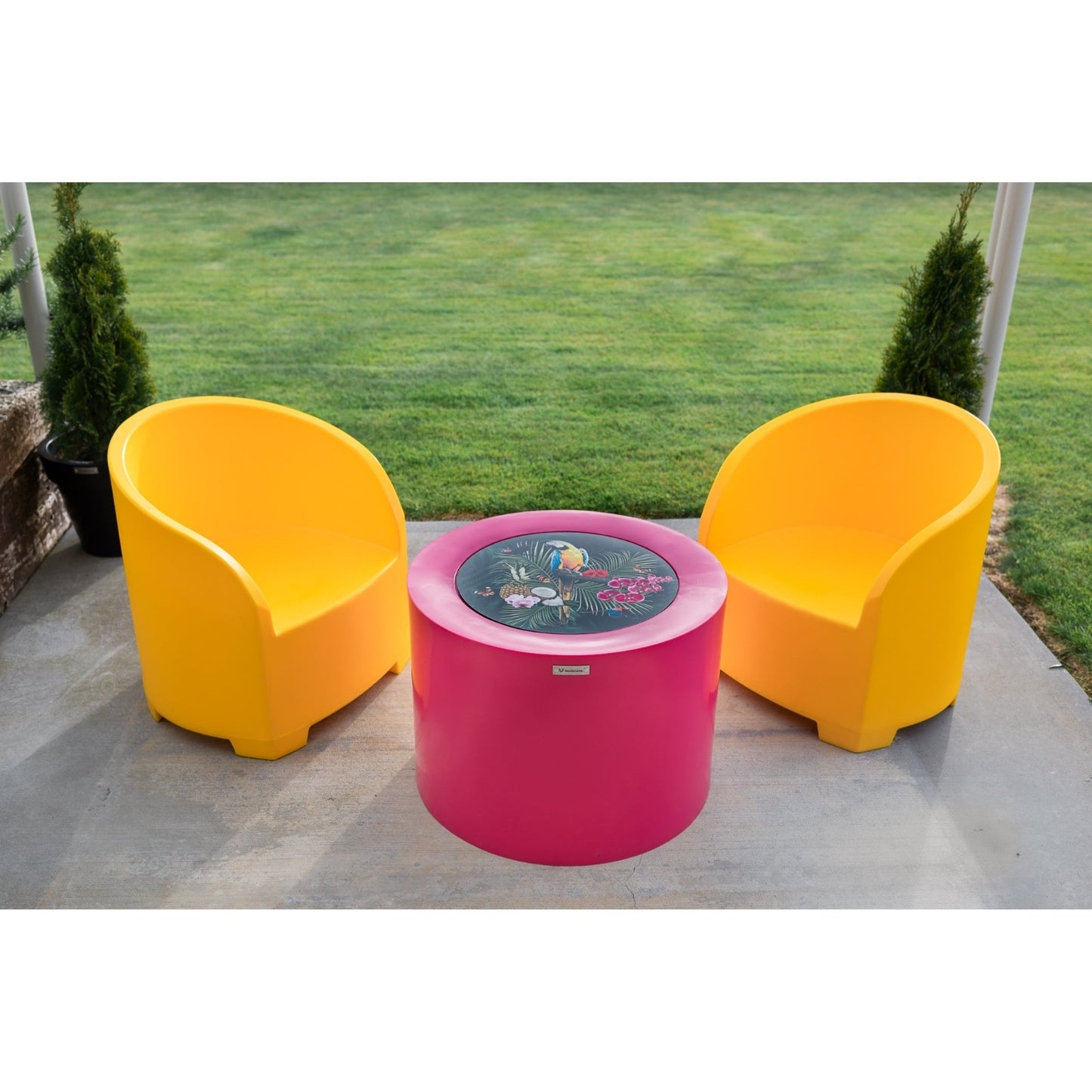 Bright yellow and pink Modscene outdoor furniture on a patio. Outdoor furniture New Zealand.