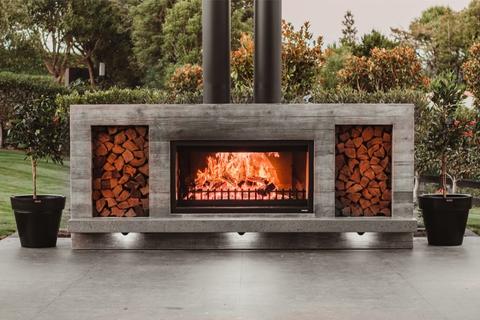 Large black Modscene planter pots by a Trendz Outdoors Fireplace in New Zealand