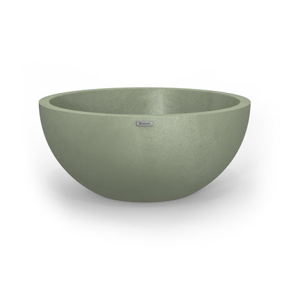 A large Modscene planter bowl in a pastel green colour with a concrete look.