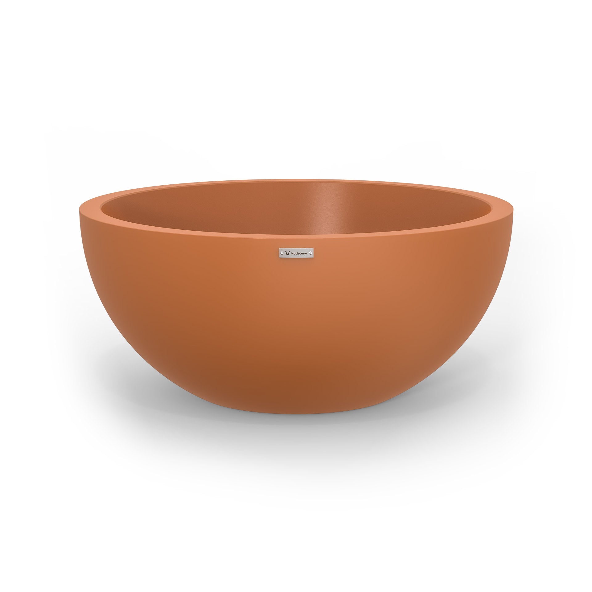A Modscene planter bowl in a terracotta colour.