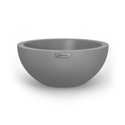 A small Modscene planter bowl in light grey with a concrete look finish.