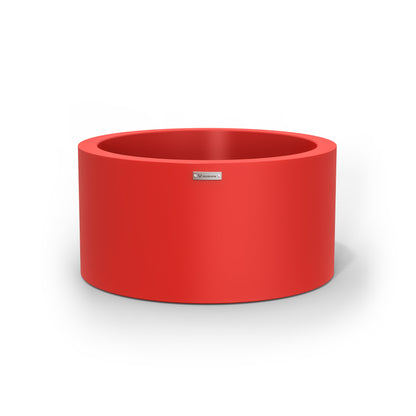 A medium cylinder shaped pot planter in red made by Modscene New Zealand. 