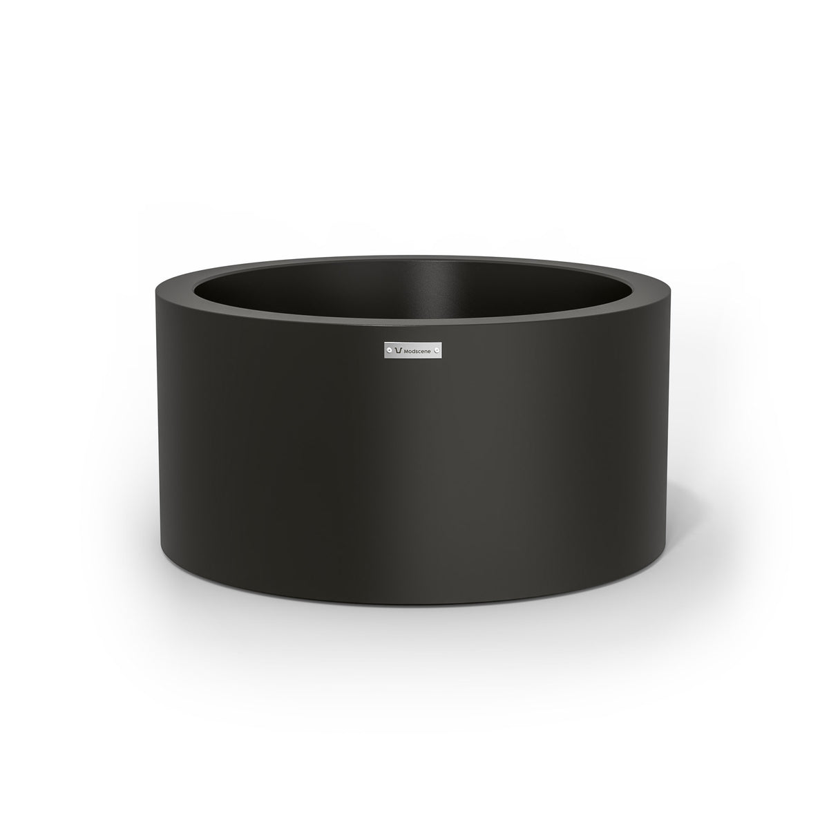 A cylinder shaped pot planter in black made by Modscene New Zealand. 