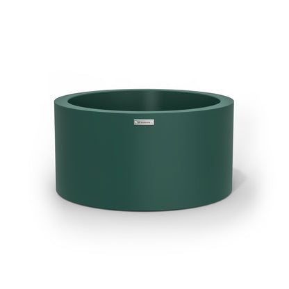 A cylinder shaped pot planter in emerald green. NZ made.