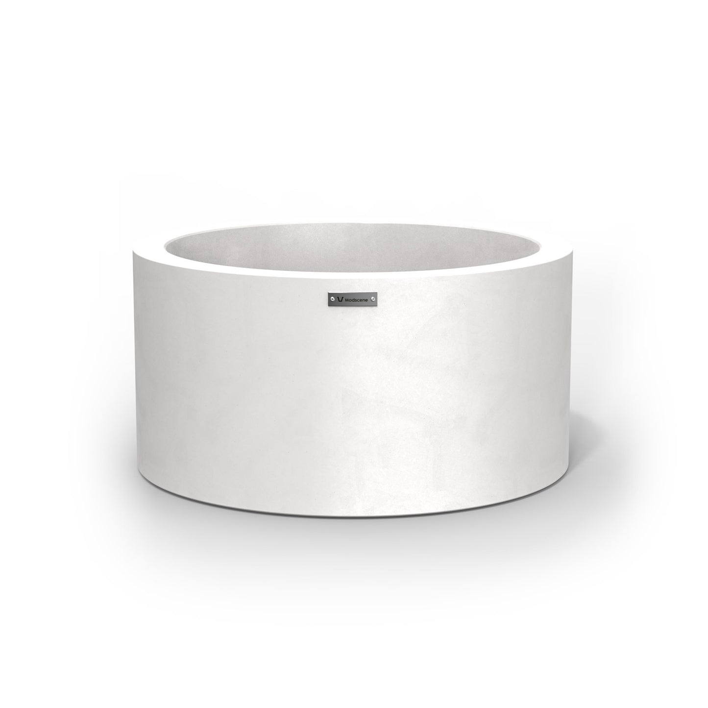 A cylinder shaped pot planter in a matte white colour.