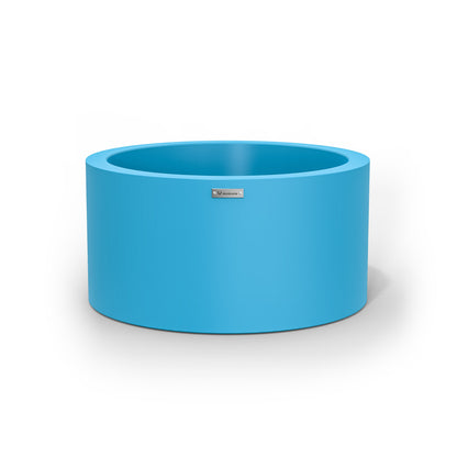 A cylinder shaped pot planter in a sky blue colour made by Modscene.