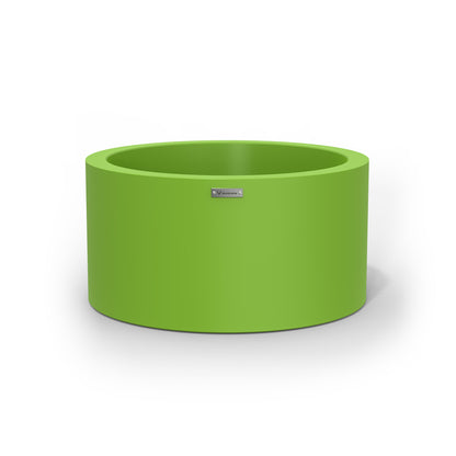 A cylinder shaped pot planter in green made by Modscene New Zealand. 