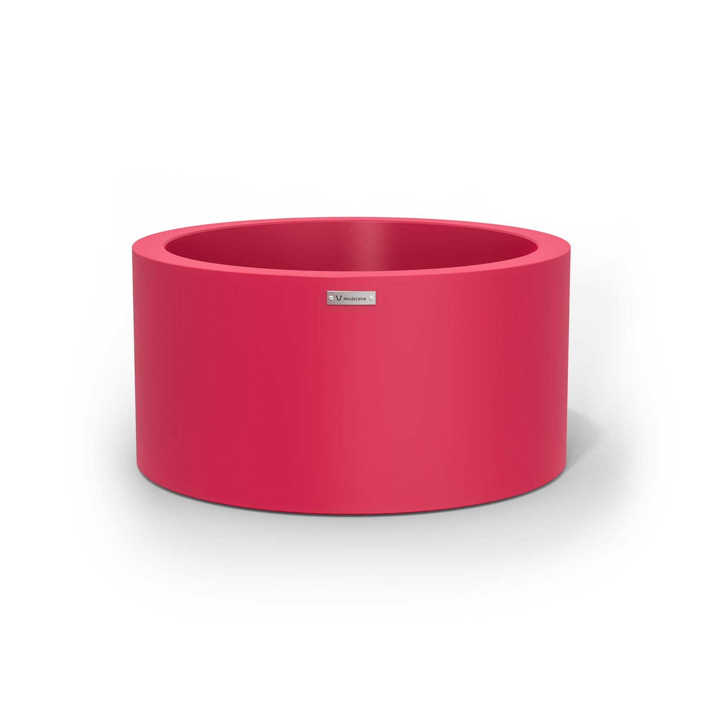 A cylinder shaped pot planter in pink made by Modscene NZ. 