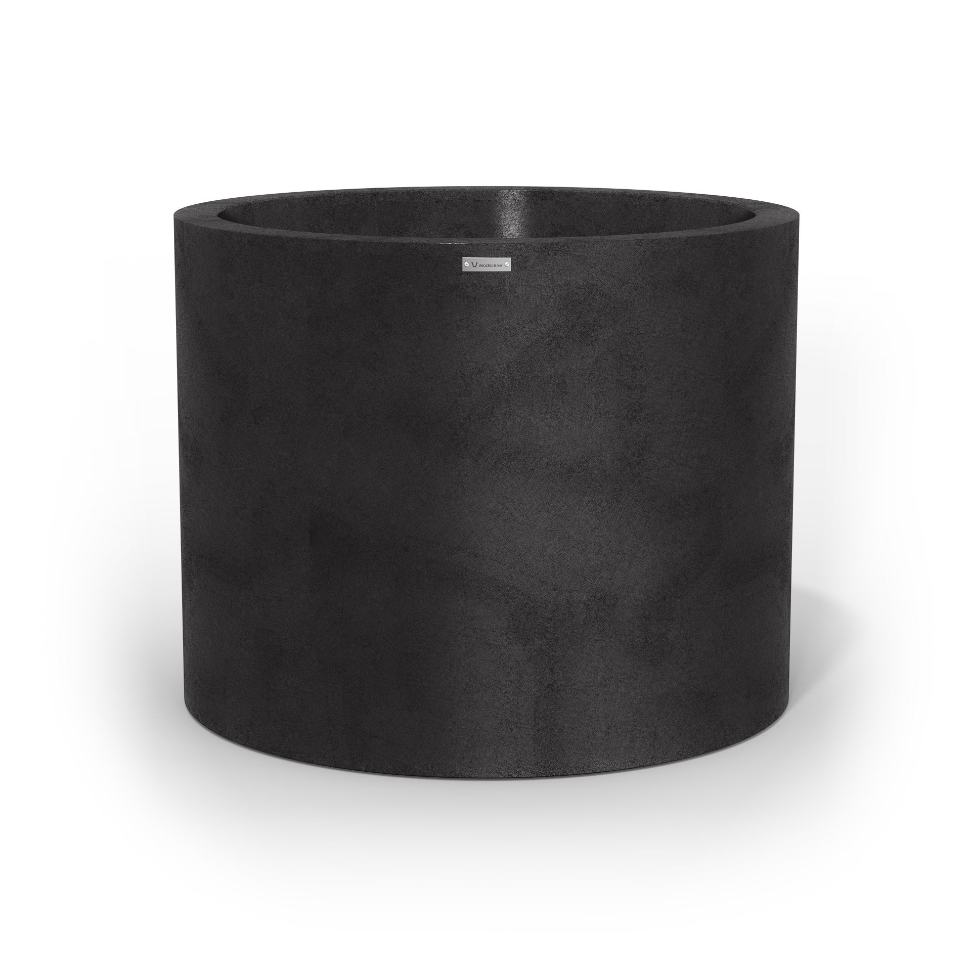 An extra large cylinder pot planter in a matte black colour. Made by Modscene NZ.