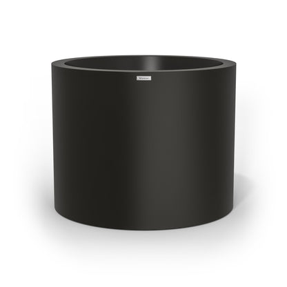 An extra large cylinder pot planter in black. Made by Modscene NZ.