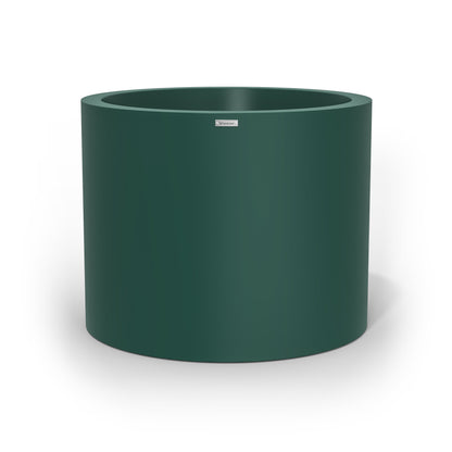 An extra large cylinder pot planter in an emerald green colour. Made by Modscene NZ.