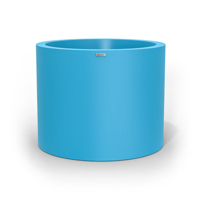An extra large cylinder pot planter in blue. Made by Modscene NZ.