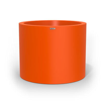 A extra large cylinder pot planter in orange. Made by Modscene NZ.