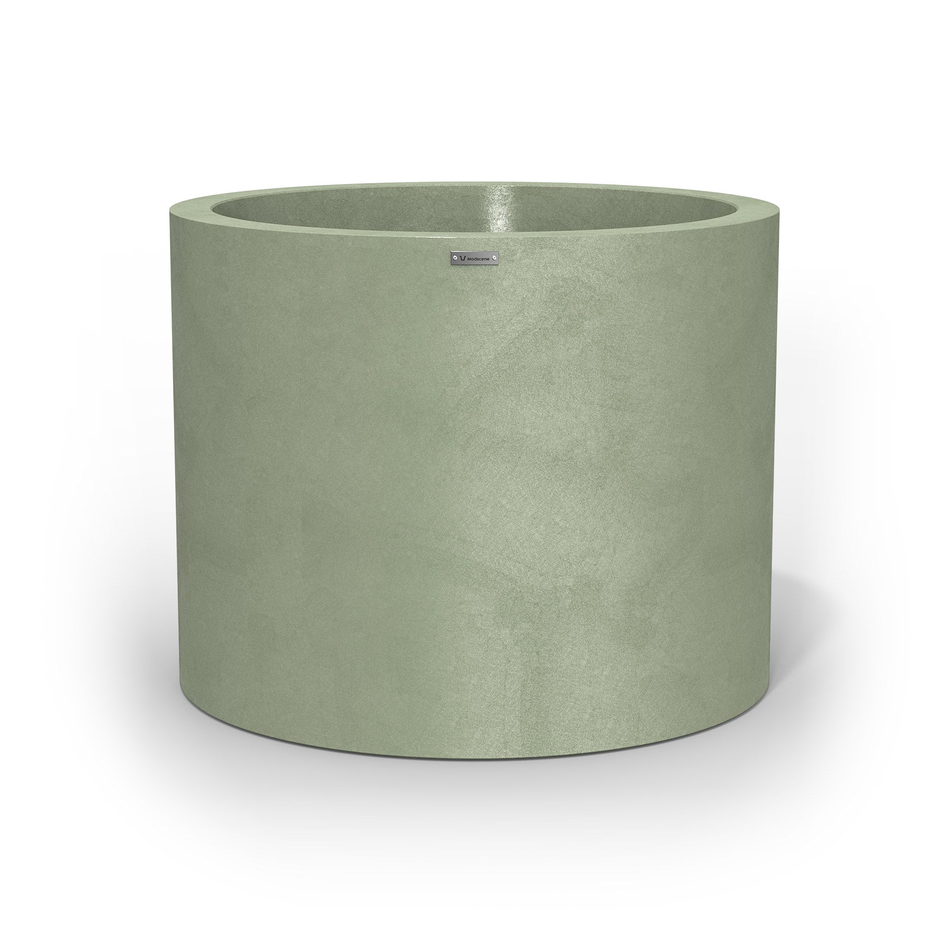 A giant cylinder pot planter in a pastel green colour with a concrete look finish.