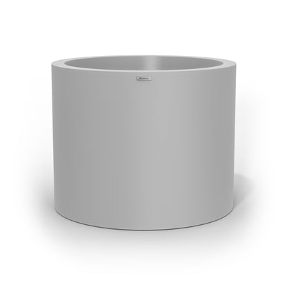 A giant cylinder pot planter in a light grey colour. Made by Modscene New Zealand.