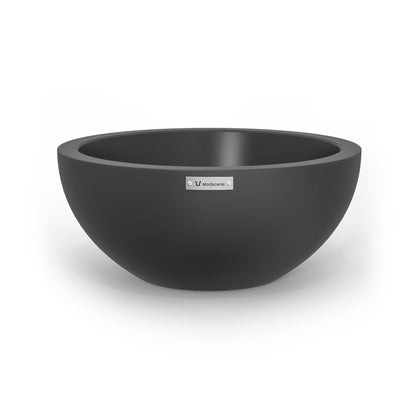 A small Modscene planter bowl in dark grey. New Zealand made.