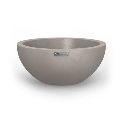 A small Modscene planter bowl with a concrete look finish.