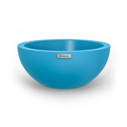 A small Modscene planter bowl in blue. New Zealand made.