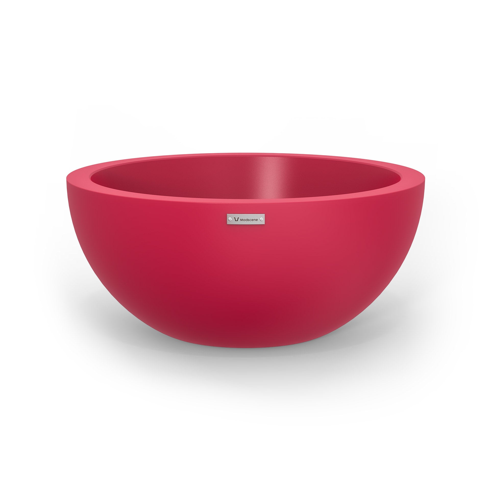 A medium Modscene planter bowl in a pink colour. New Zealand made.