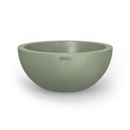 A medium Modscene planter bowl in pastel green with a concrete look.