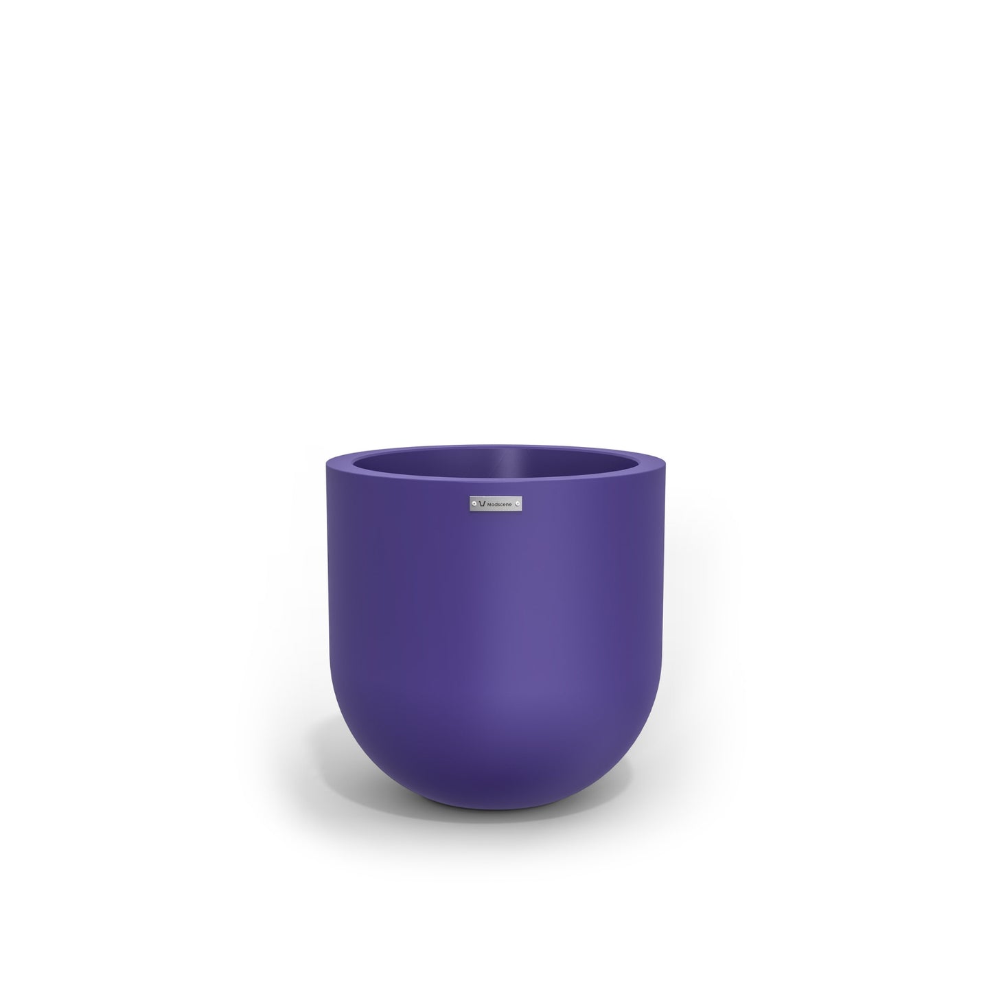 A small round pot made by Modscene in a purple colour. NZ made planters.