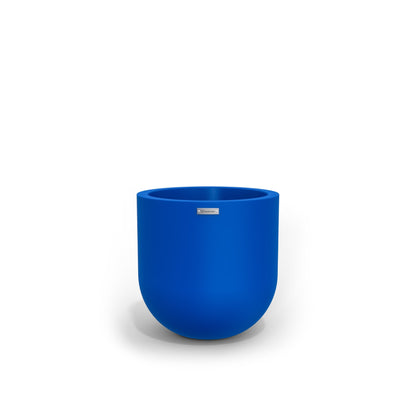 A small round pot made by Modscene in a dark blue colour. NZ made planters.