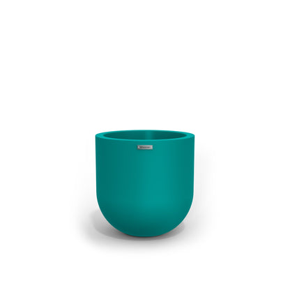 A small round pot made by Modscene in a turquoise colour. NZ made planters.