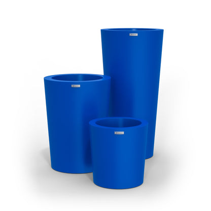 A cluster of three Modscene planter pots in a deep blue colour.