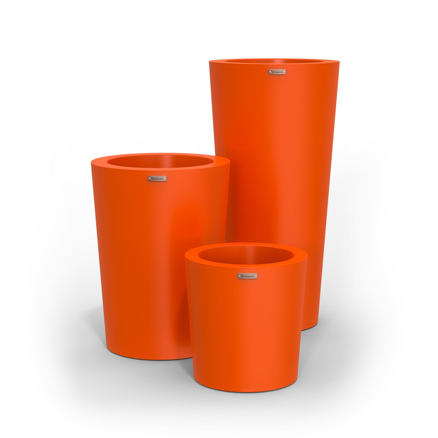 A orange cluster of three Modscene planter pots. Made in New Zealand.