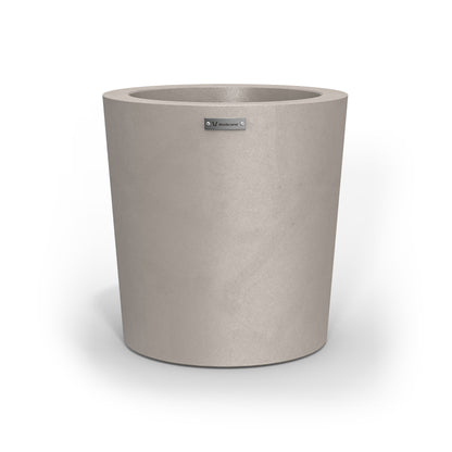 A Modscene planter pot in a sandstone colour with a concrete finish.