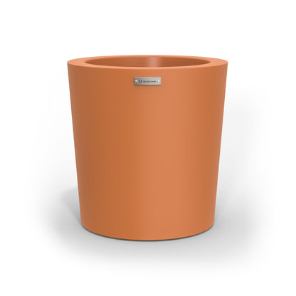 A modern style planter pot in a terracotta colour. Made by Modscene NZ.